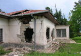 Casa de la comunidad sobre la que cayó la bomba en octubre de 2008, en Rubare